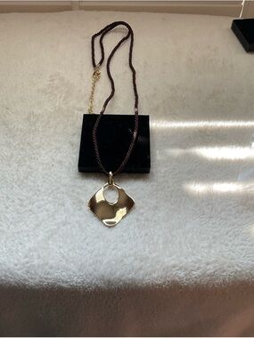 Contemporary Gold-Tone Geometric Pendant Necklace in Brown Cord